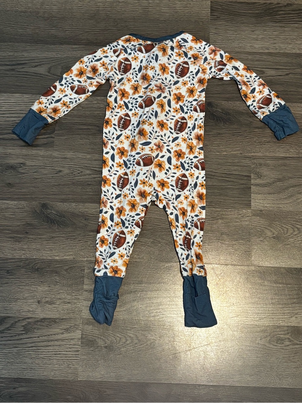 Children's Floral & Football Footed One-Piece in White and Orange with Navy Trim - Picture 2 of 4
